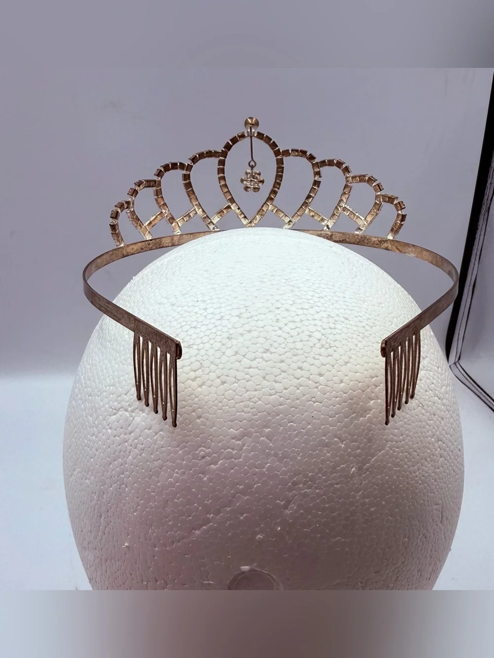 Silver Toned Metal And Rhinestone Tiara With Dangling Flower Center
